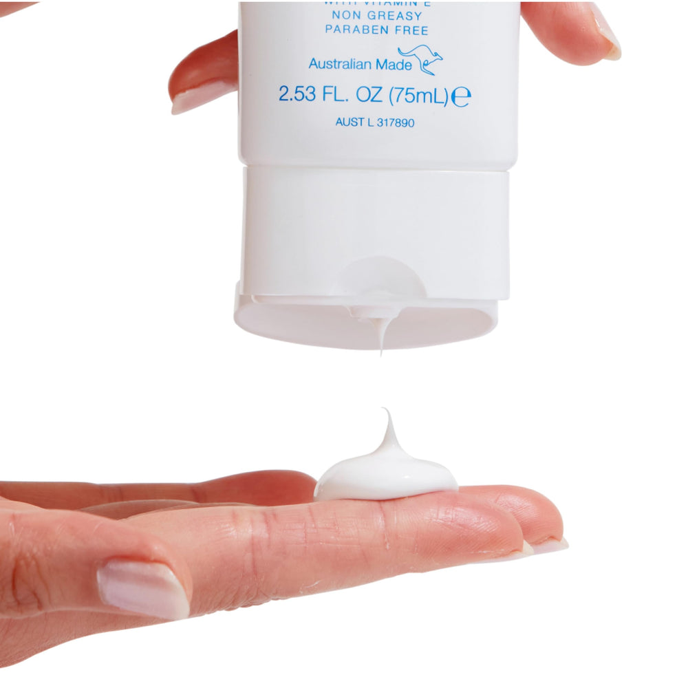 Bondi Sands fragrance free daily sunscreen being applied to the face for quick absorption.