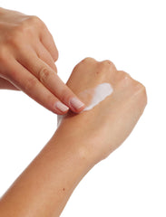 Bondi Sands Skin Firming Gradual Tanning Lotion cream texture spreads evenly for a seamless finish