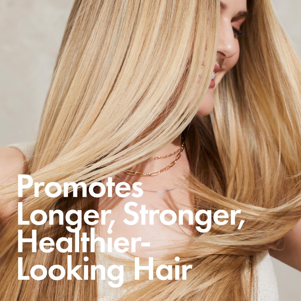 BondiBoost Elixir Hair Oil on flyaways demonstrates tame results.