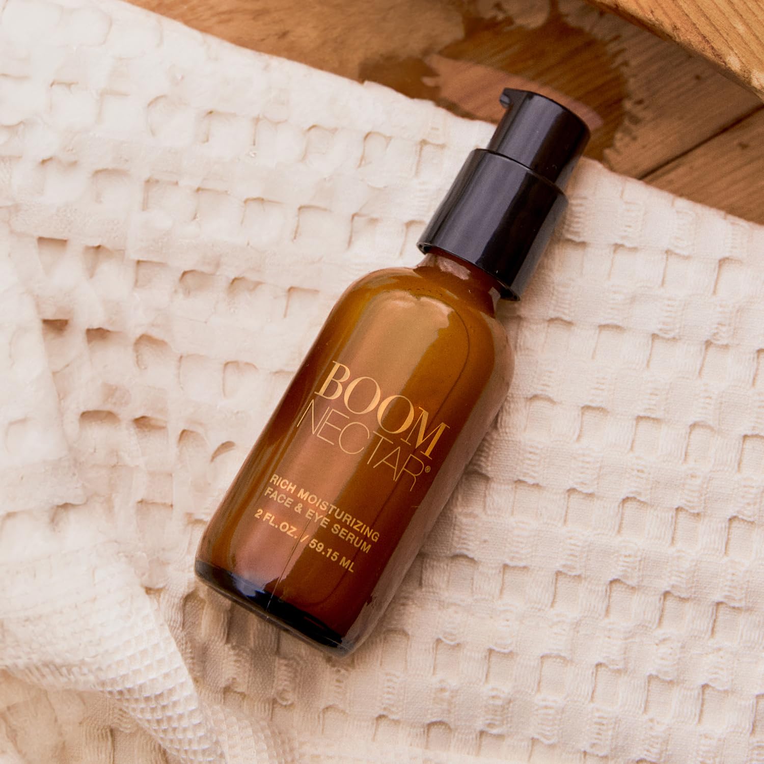 BOOM Nectar serum dropper demonstrates precise, gentle application for sensitive skin.