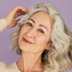 Close-up of BOOM Silver Conditioner ingredients with shea butter and jojoba oil