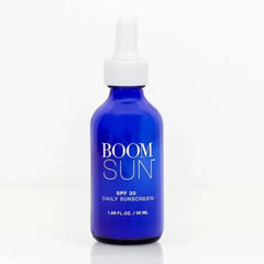 BOOM! Sun bottle closeup shows velvety glow for mature skin.