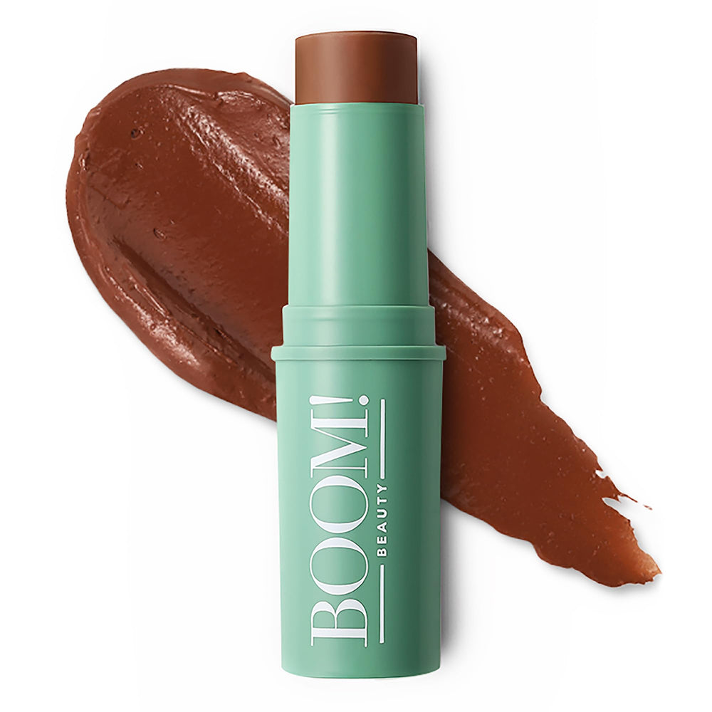 Boomstick Bronze cream blush-stick on cheek for buildable warmth and glow.