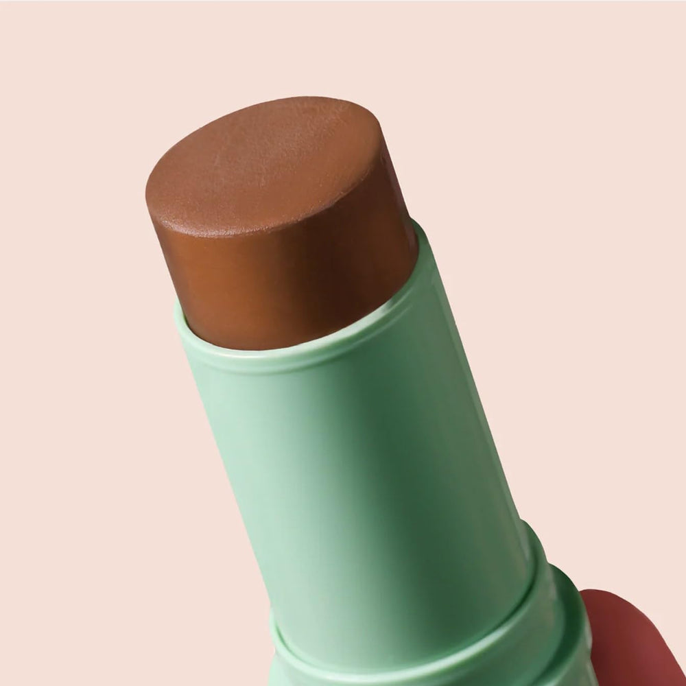 Boomstick Bronze eyeshadow on lid for subtle sun-kissed accent.