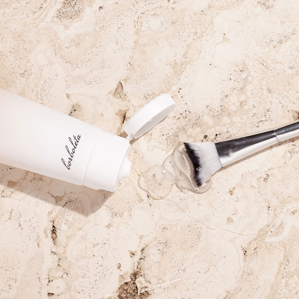 Borboleta Lash Bath Gel Cleanser travel-size bottle ready for on-the-go lash care.