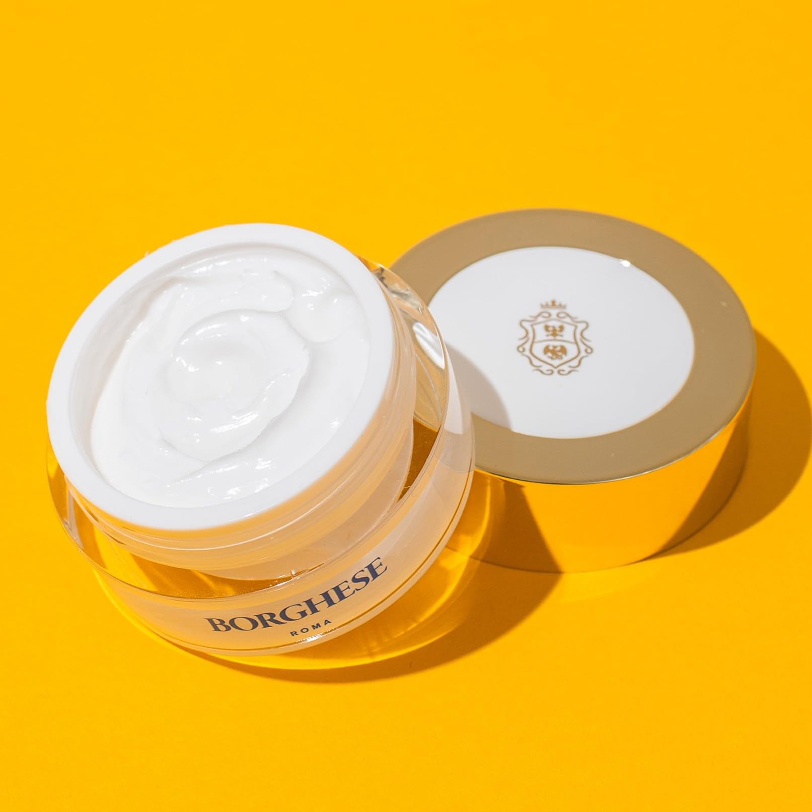 Closeup of Borghese Restorative Eye Cream highlighting hyaluronic hydration