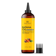 Botanic Hearth Batana Oil dropper ready for precise scalp application