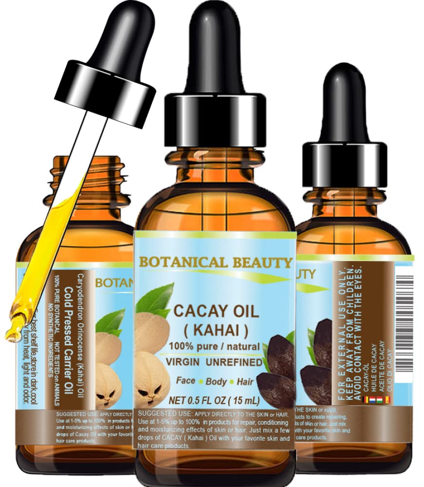 Botanical Beauty CACAY oil bottle showing fast absorption on skin.