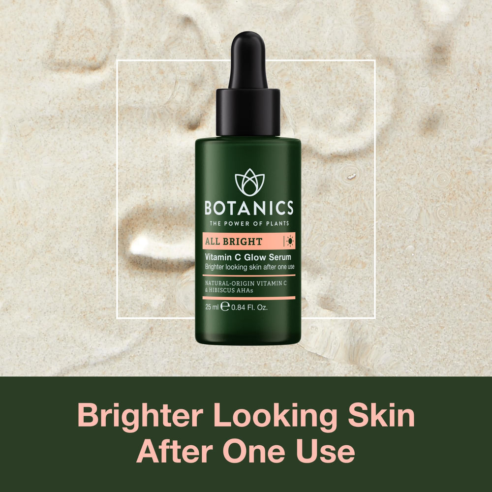 Botanics Vitamin C Serum bottle close-up with luminous glow