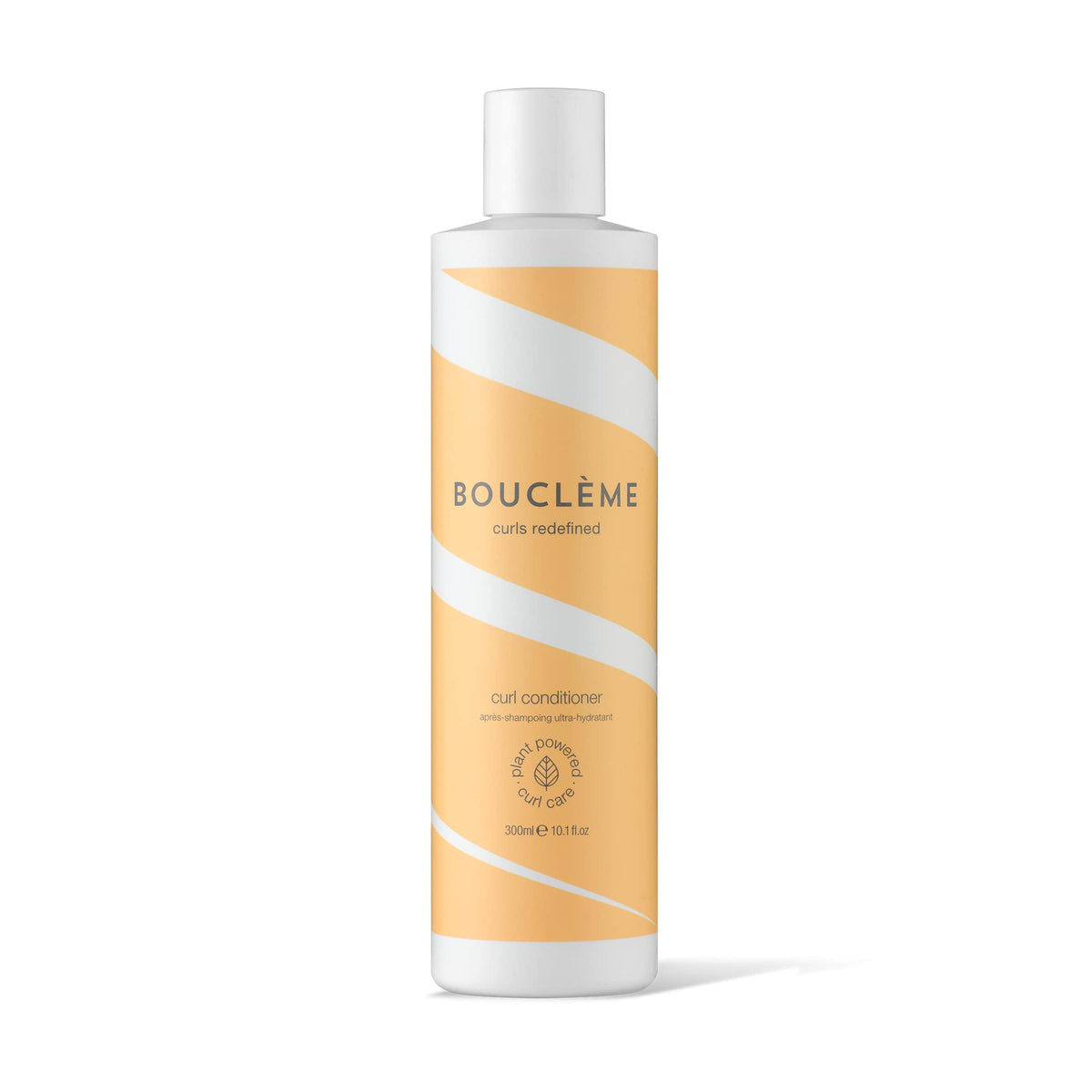 Boucleme Curl Conditioner bottle close-up shows hydrating curl care