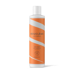Bouclème Seal + Shield conditioner bottle delivering hydration and humidity protection for curls.