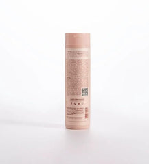 Braé Essential Shampoo label closeup highlighting color-safe daily-use formula.