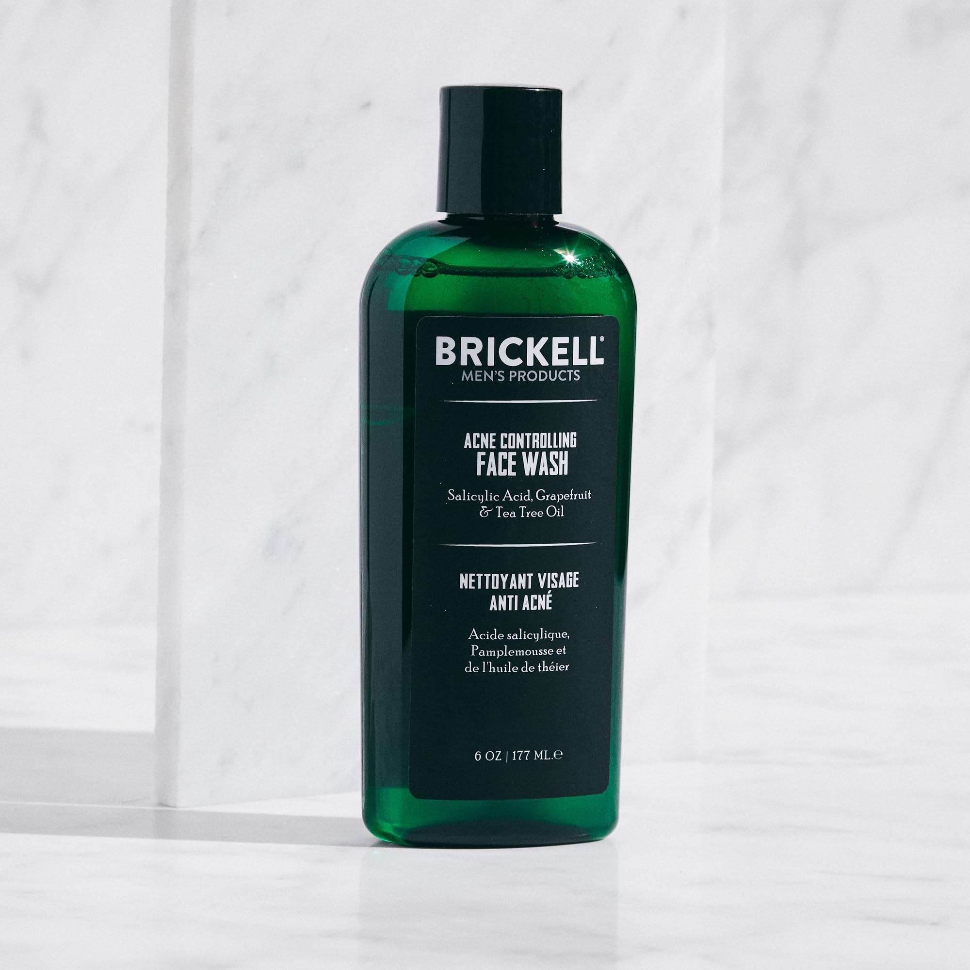 Brickell Men's Acne Face Wash foaming lather shows refreshing citrus scent