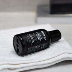 Brickell Men's Acne Controlling Moisturizer texture swirl indicating lightweight hydration.