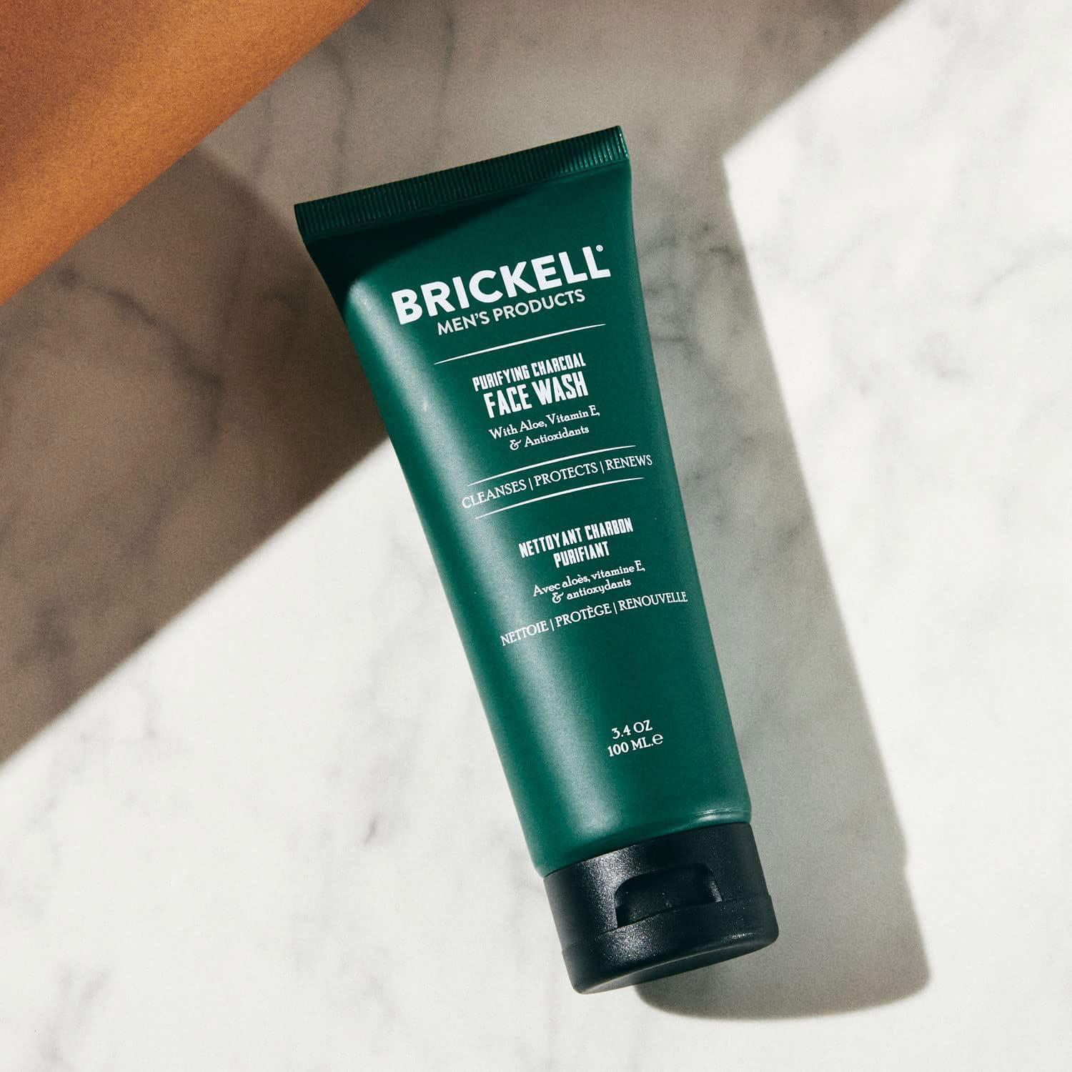 Brickell Men's Purifying Charcoal Face Wash bottle pour enables a light, thorough lather.