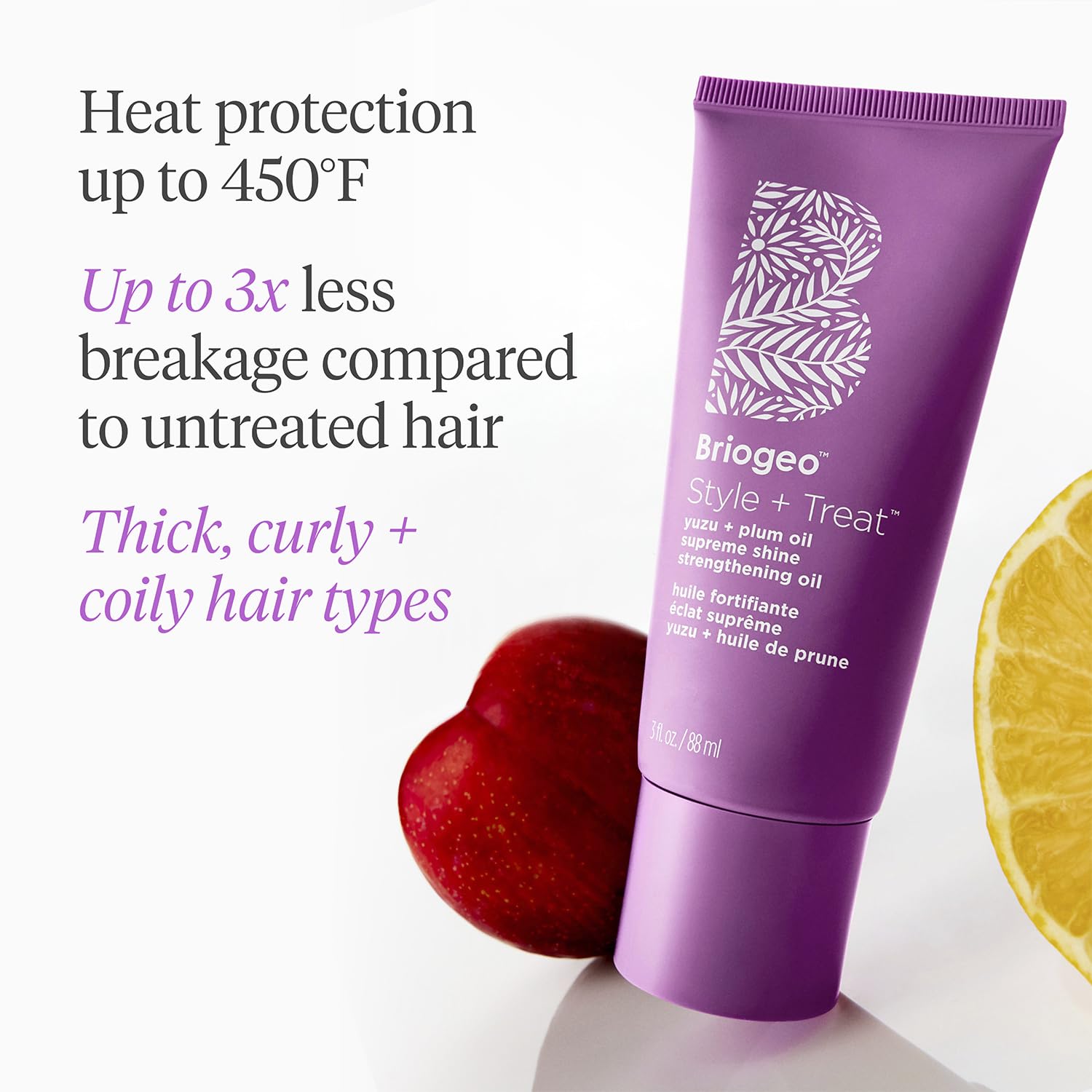 Curly hair model with radiant shine from Briogeo oil