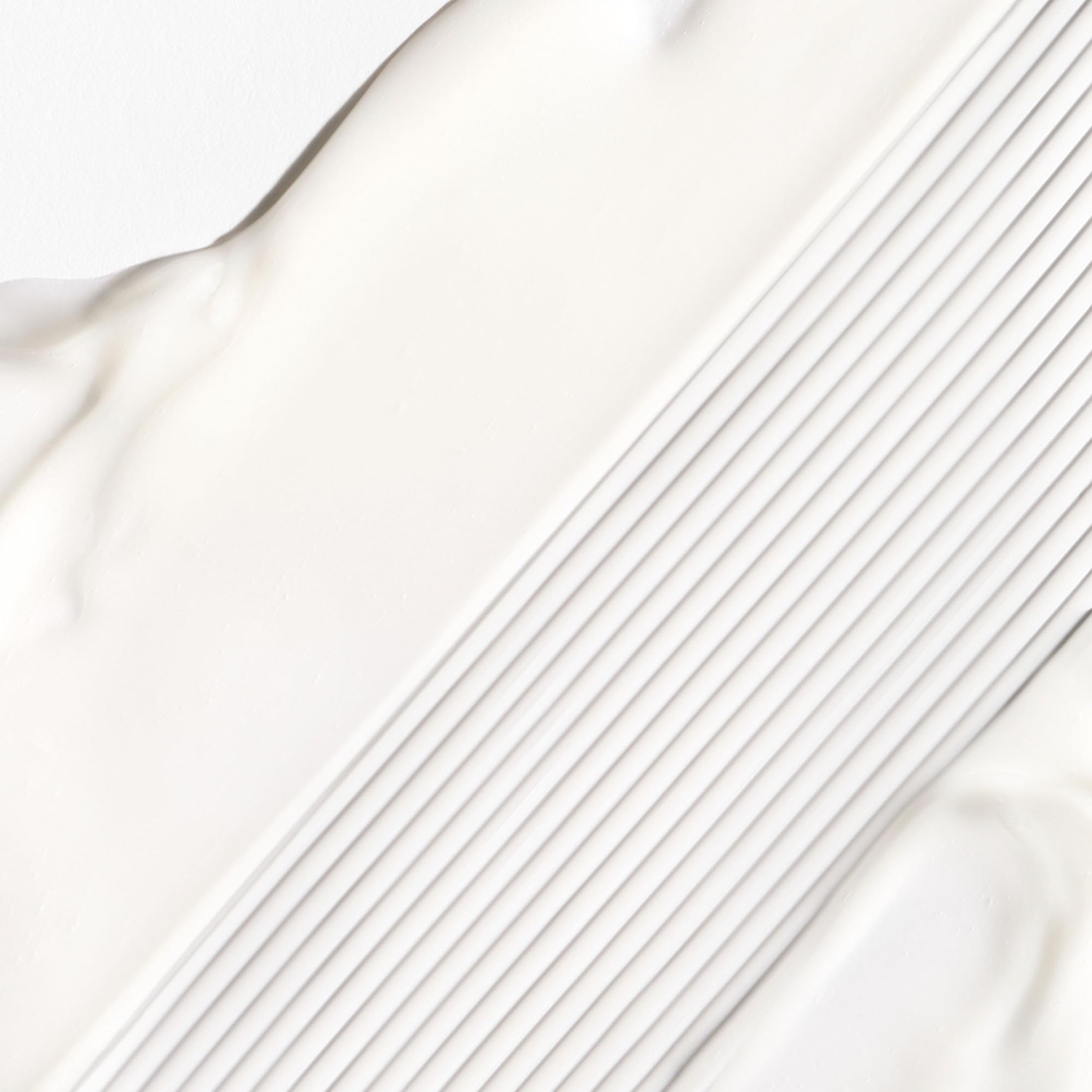 Briogeo Don't Despair, Repair! application scene highlighting creamy texture and easy distribution