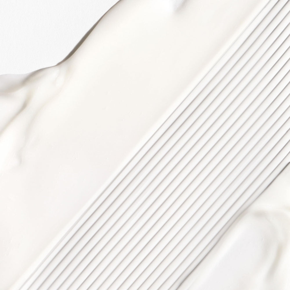 Briogeo Don't Despair, Repair! application scene highlighting creamy texture and easy distribution