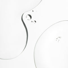 Briogeo Don't Despair, Repair! applying drops demonstrates customizable use for different hair densities