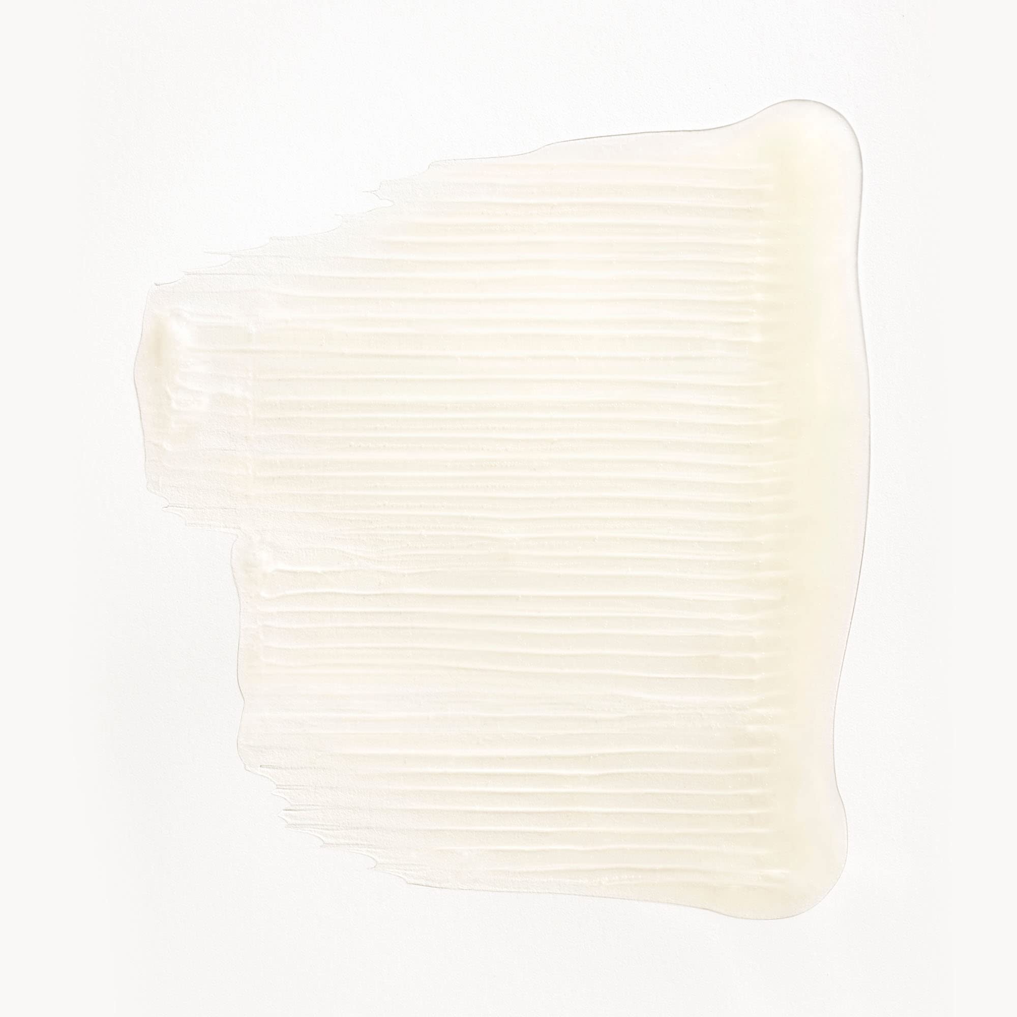 Close-up of rich lather forming, showing hydration potential for dry hair.