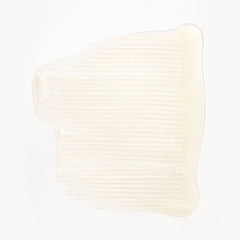 Shampoo pump dispensing Briogeo product for controlled application.