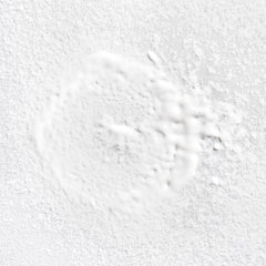 Rosarco Milk being applied for detangling moisture on damp curls
