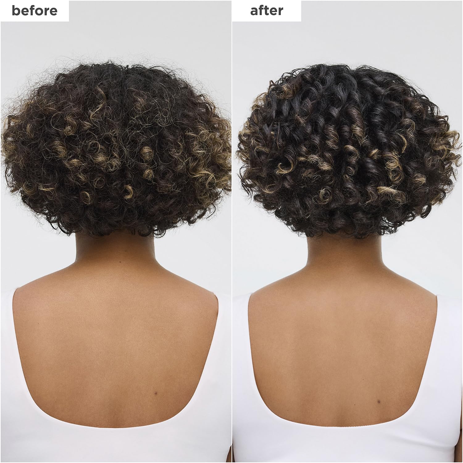 Applying Briogeo oil to wet hair for a smooth, glossy finish