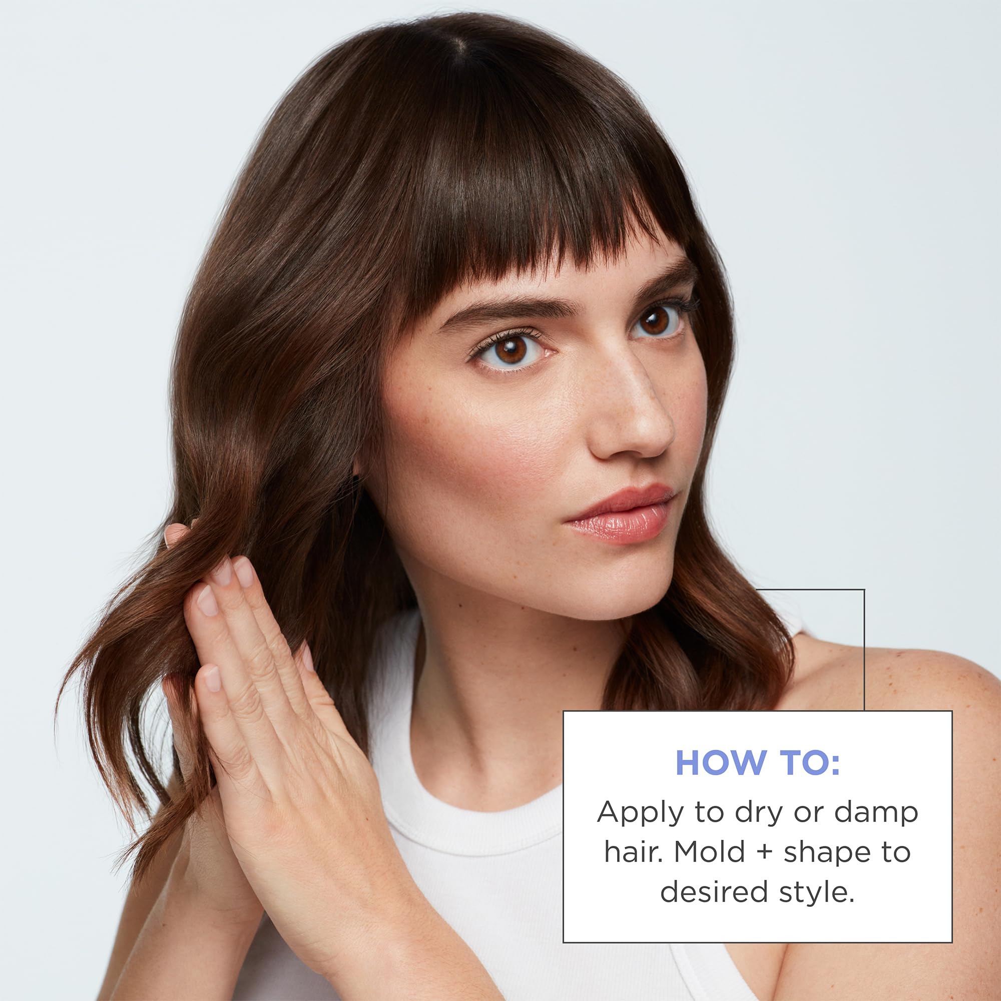 Model displays a polished, moveable hairstyle achieved with Briogeo creme.