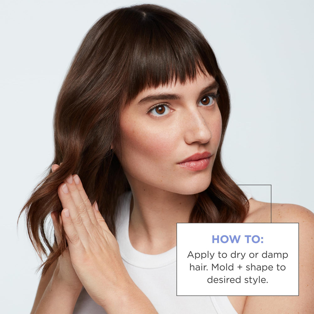 Model displays a polished, moveable hairstyle achieved with Briogeo creme.