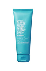 Briogeo Style + Treat Yuzu Plum Oil Air Dry Cream bottle close-up showing frizz control