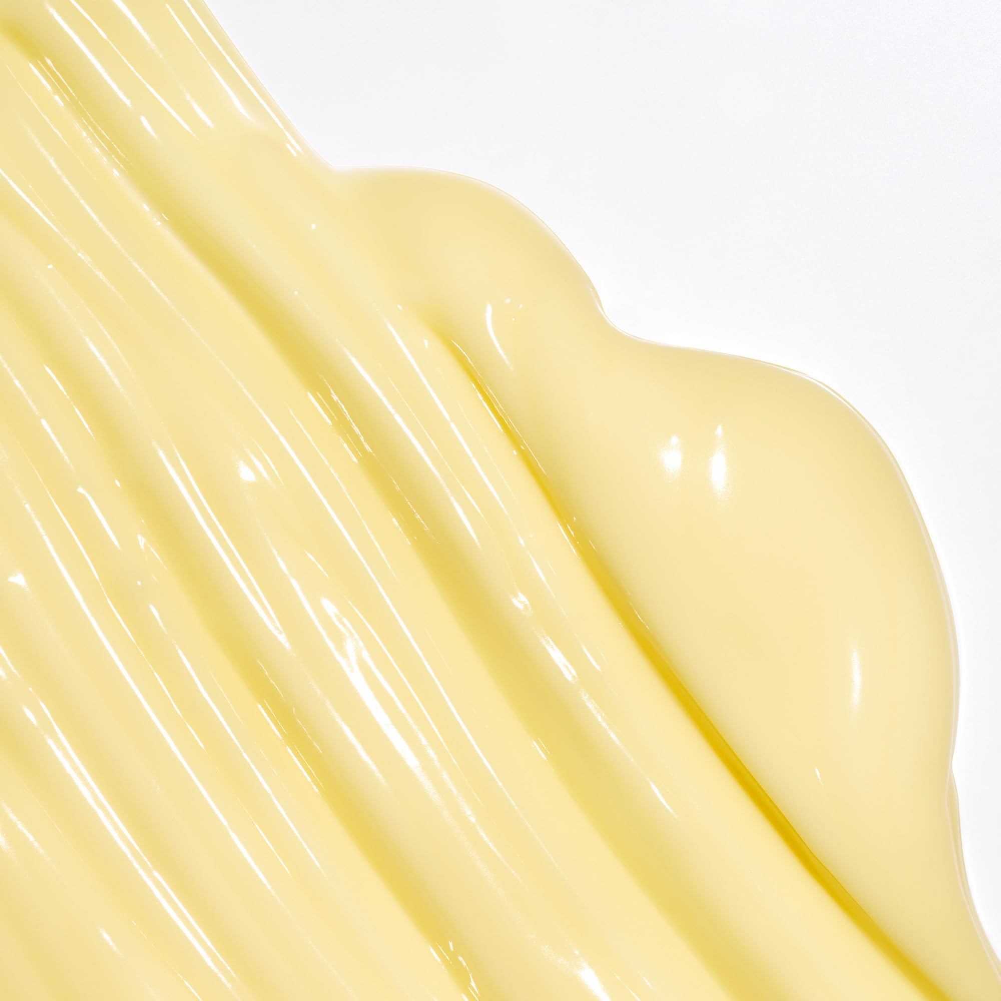 Briogeo conditioner bottle pour shows creamy texture ideal for detangling.