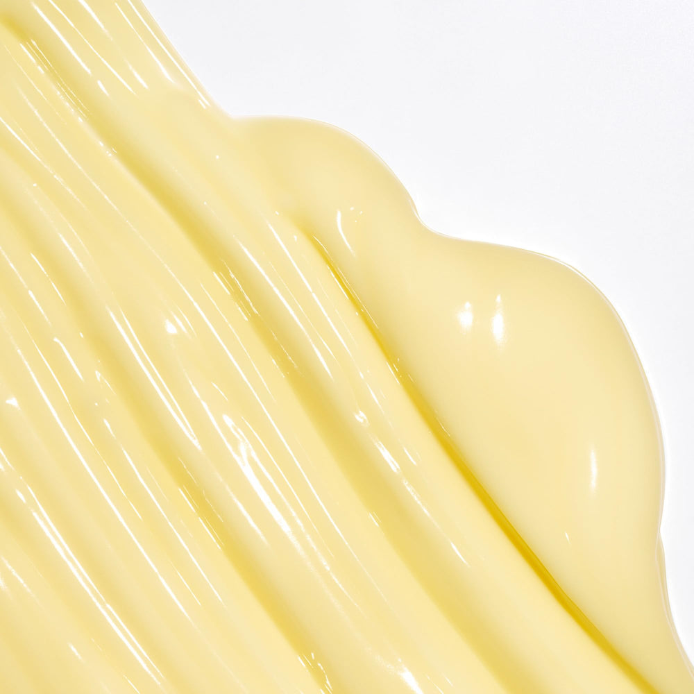 Briogeo conditioner bottle pour shows creamy texture ideal for detangling.