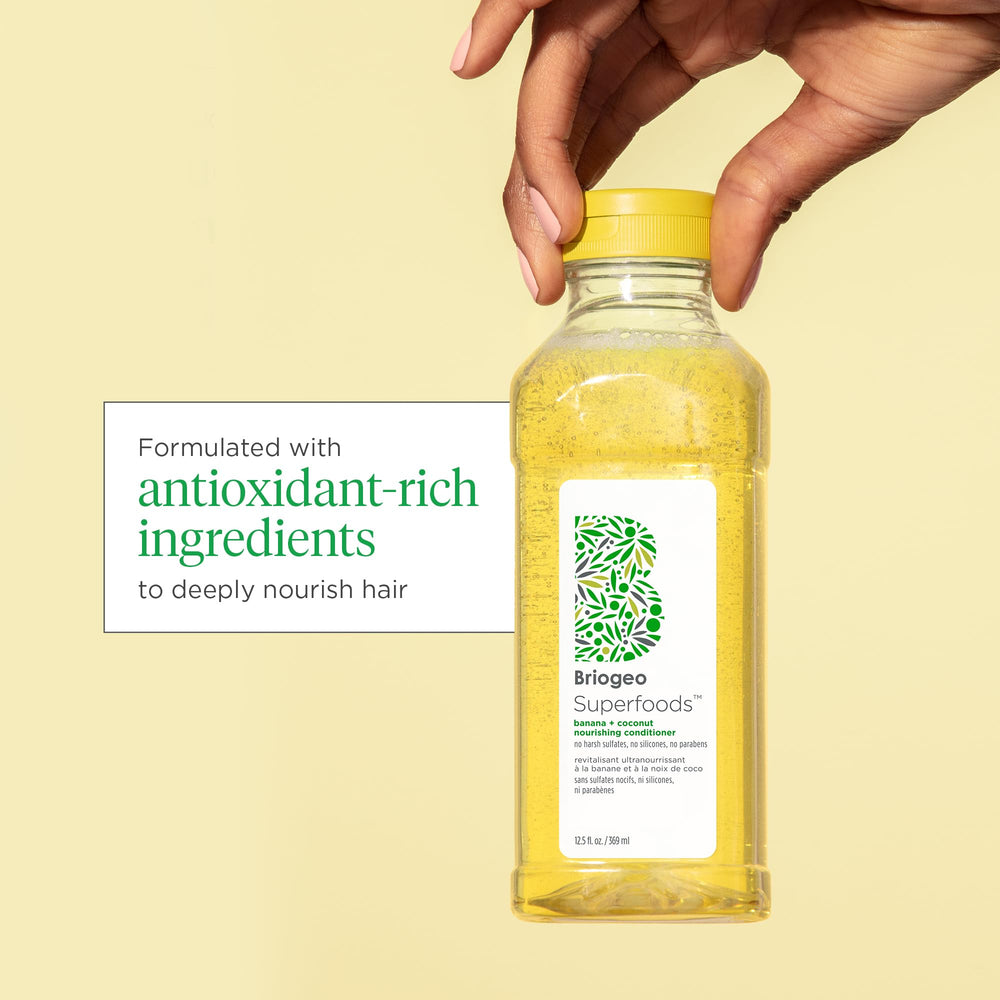 Briogeo Superfoods Banana Coconut Shampoo lather close-up shows creamy cleansing