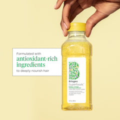 Briogeo Superfoods Banana Coconut Shampoo lather close-up shows creamy cleansing
