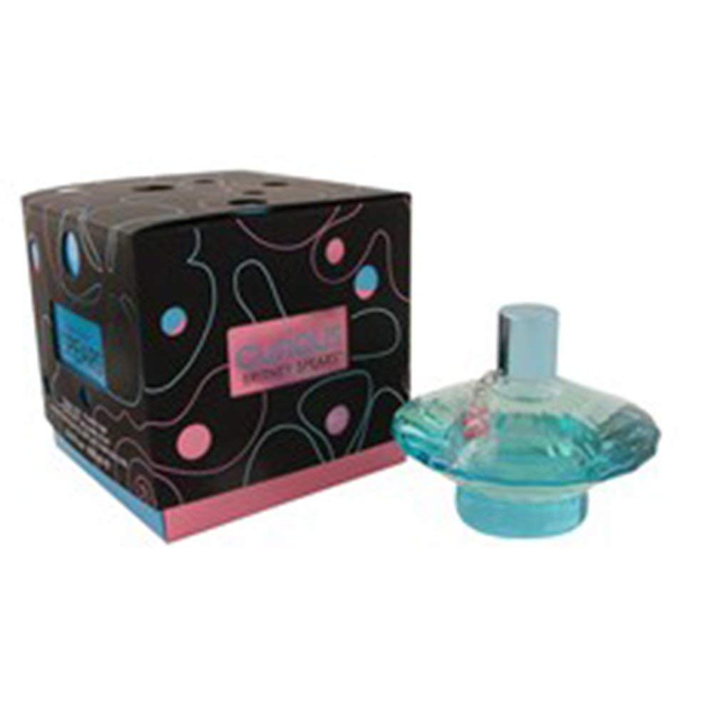 Britney Spears Curious spray action illustrating fragrance diffusion.