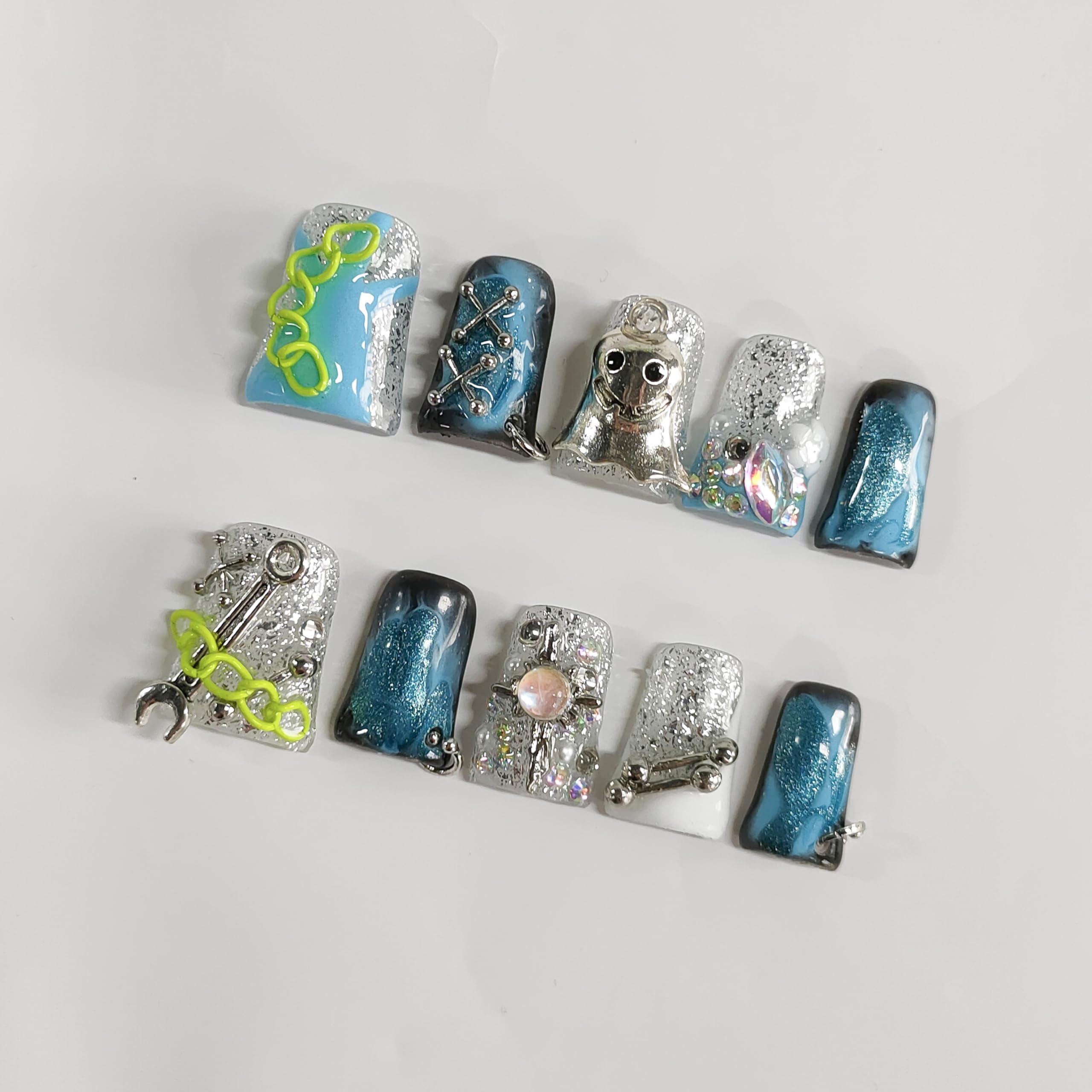 BRKYKGK blue Gothic nails with rhinestones enhance any costume or event.