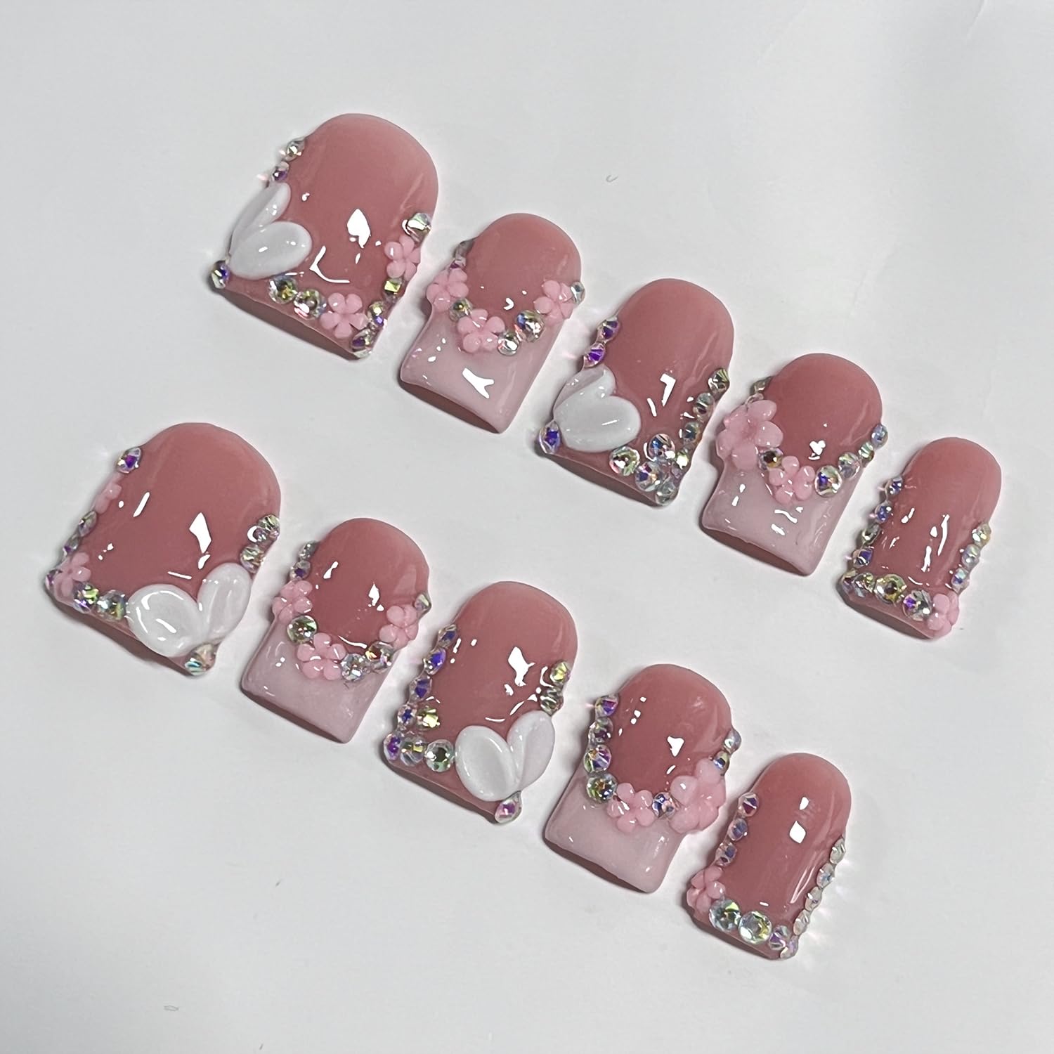 BRKYKGK pink nail design with flower detail for wearable everyday glamour.