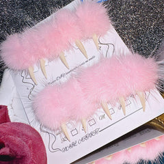 BRKYKGK nails with pink fuzzy ball design for playful party-ready style.