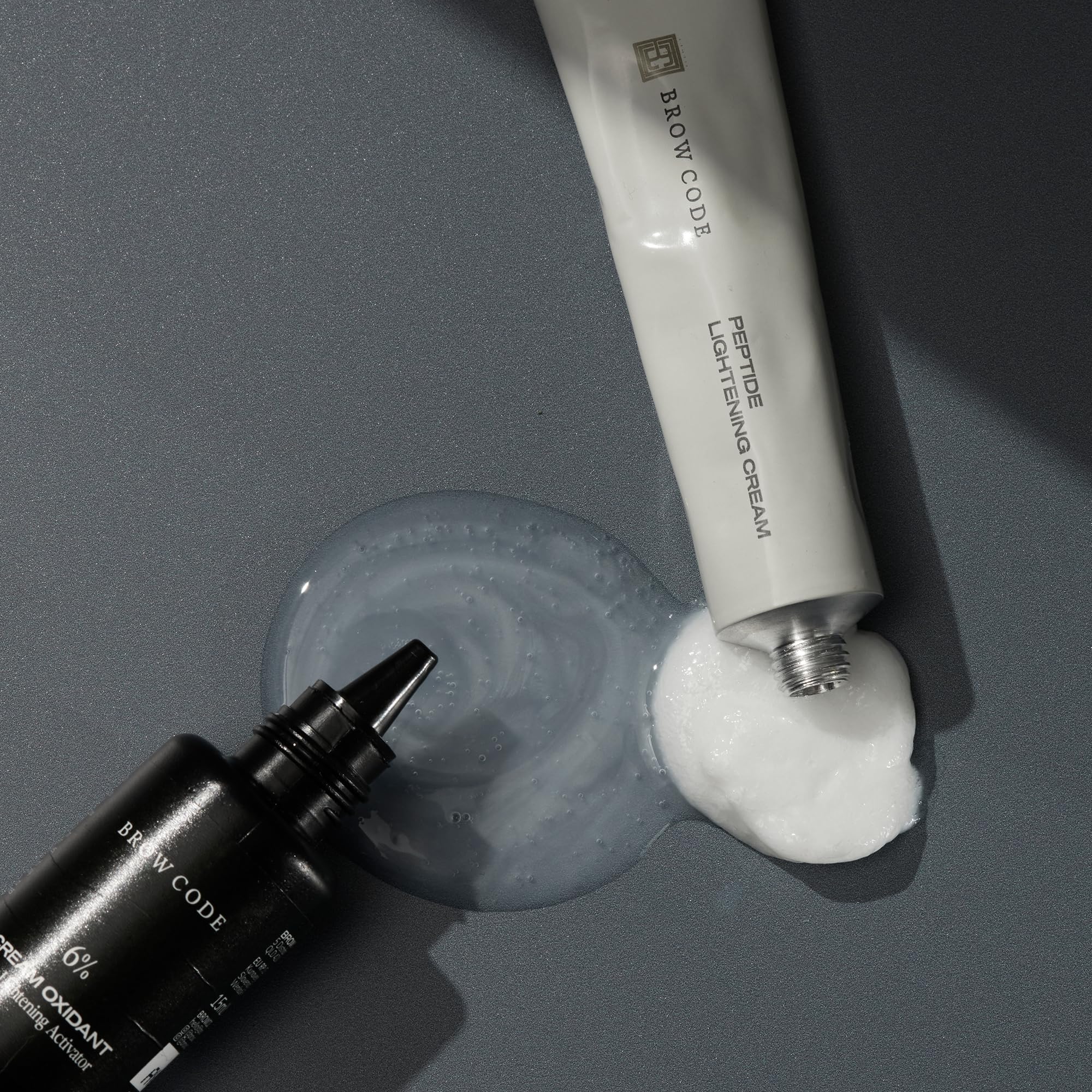 Brow Code mixing dish for even pigment blending during use.