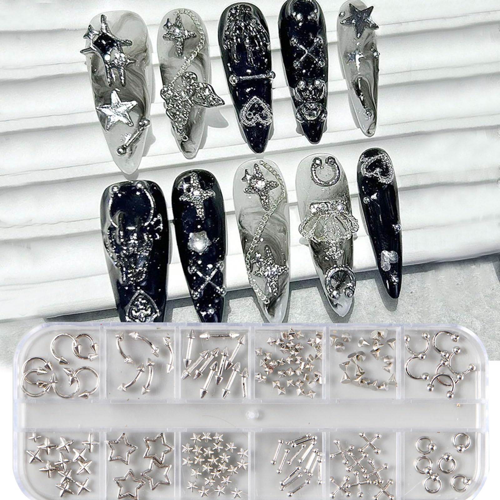 Brtavizvy silver and black steel balls enhance Y2K nail aesthetics.