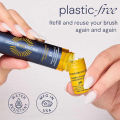 Brush On Block refill twist-open cap showing portable, mess-free sunscreen solution.