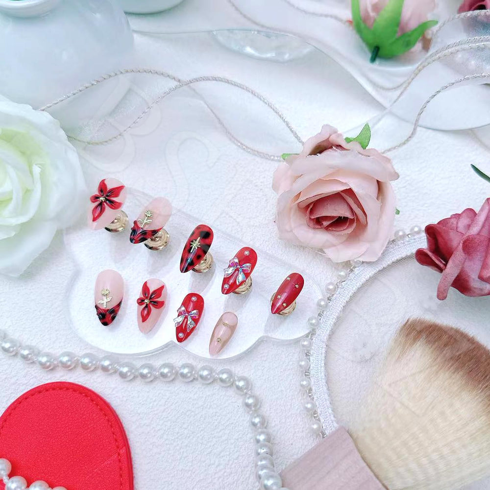 BSBTBZ pearl-floral art nails introduce delicate texture for elegant day-to-night wear.