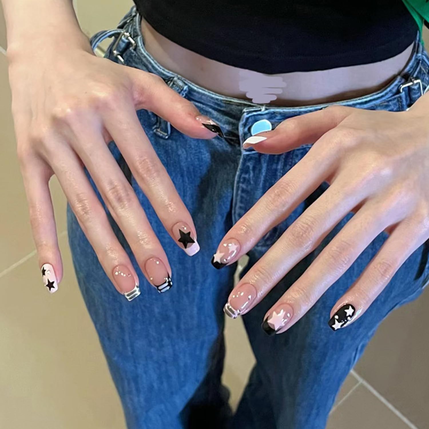 BSBTBZ Nails with glue and tools in package for easy at-home apply.