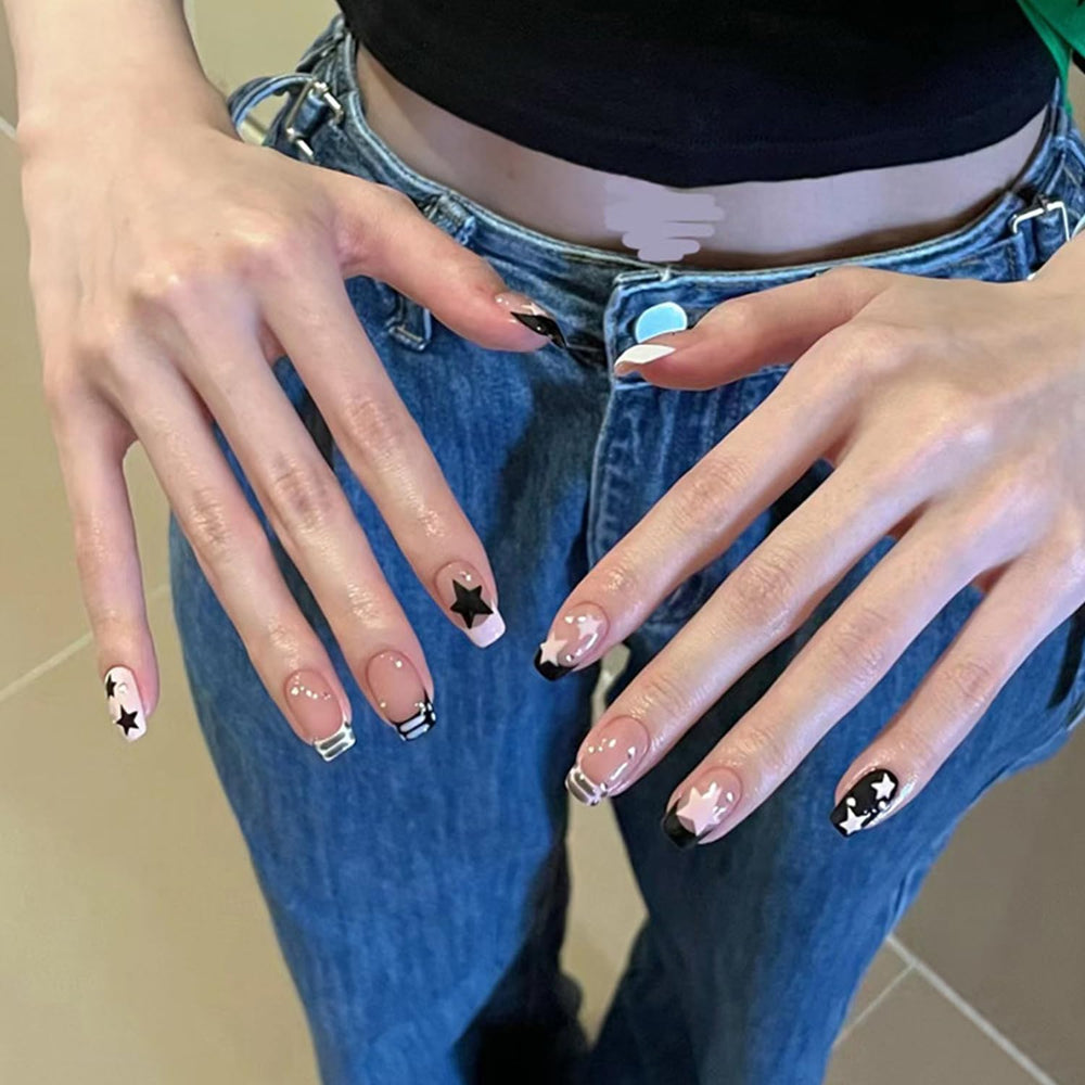 BSBTBZ Nails with glue and tools in package for easy at-home apply.