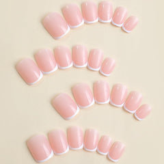 BSBTBZ press-on nails close-up top view showing glossy pink tips