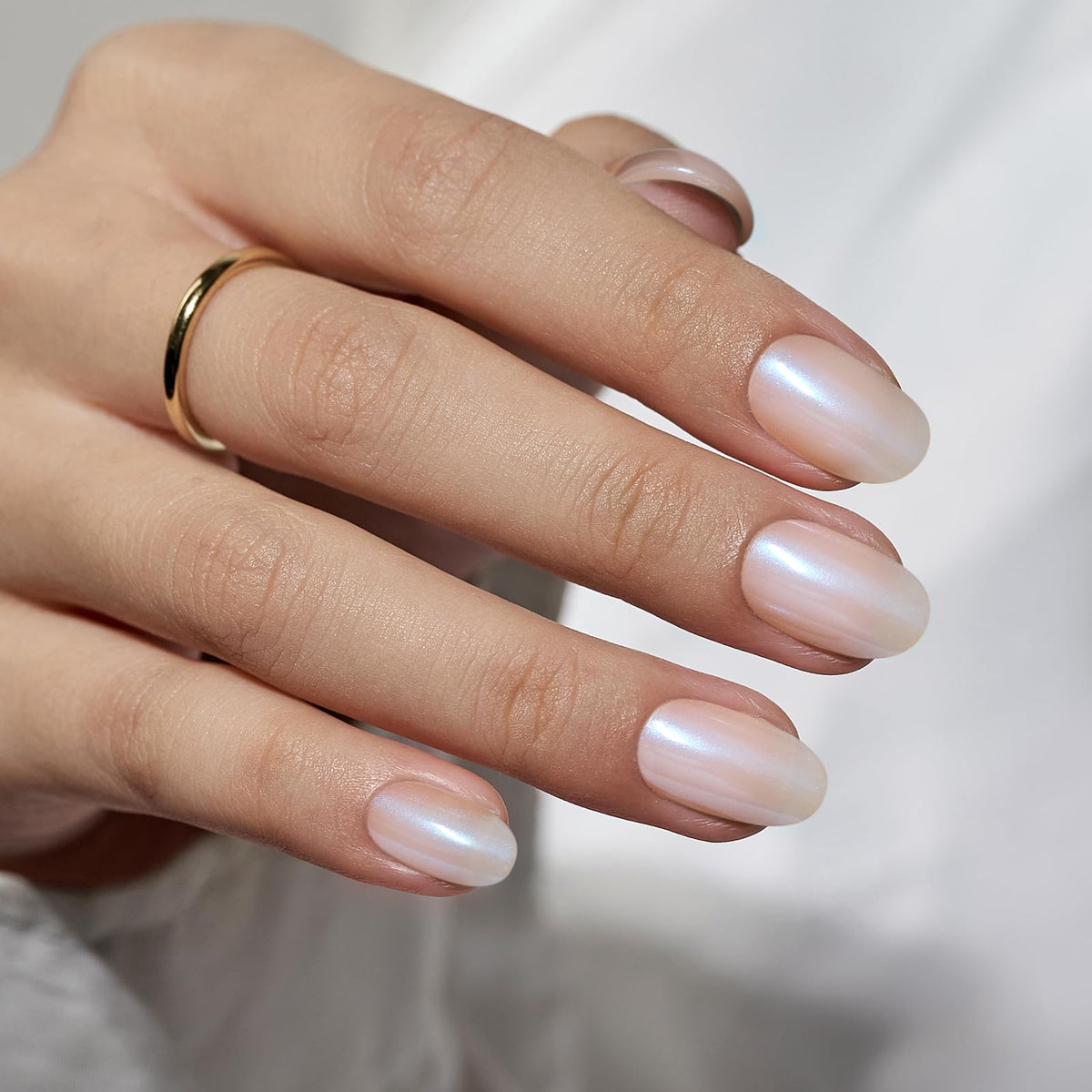 BTArtbox chrome christmas nails short close-up showing pearl shimmer for elegant styling.