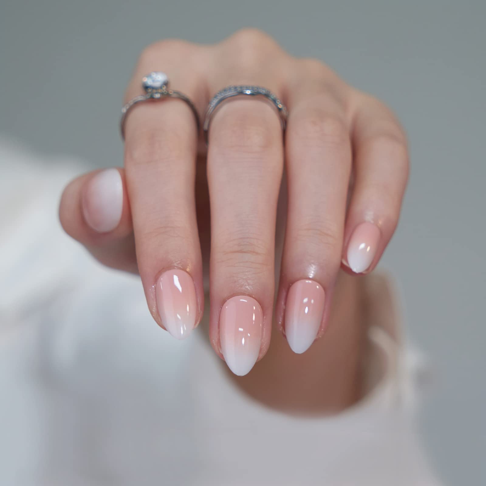 BTArtbox hands wearing almond nails; daily-life ready look.
