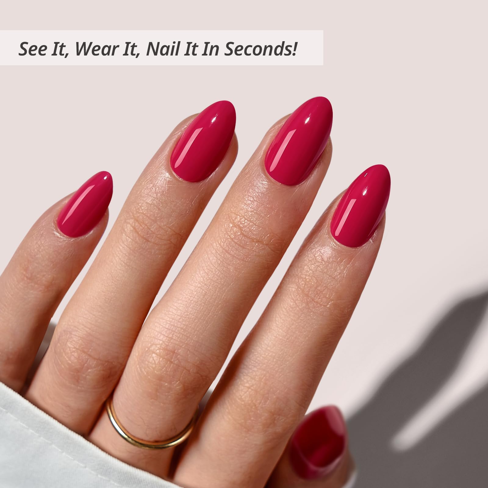 BTArtbox raspberry red kit with glue included for quick at-home manicures.