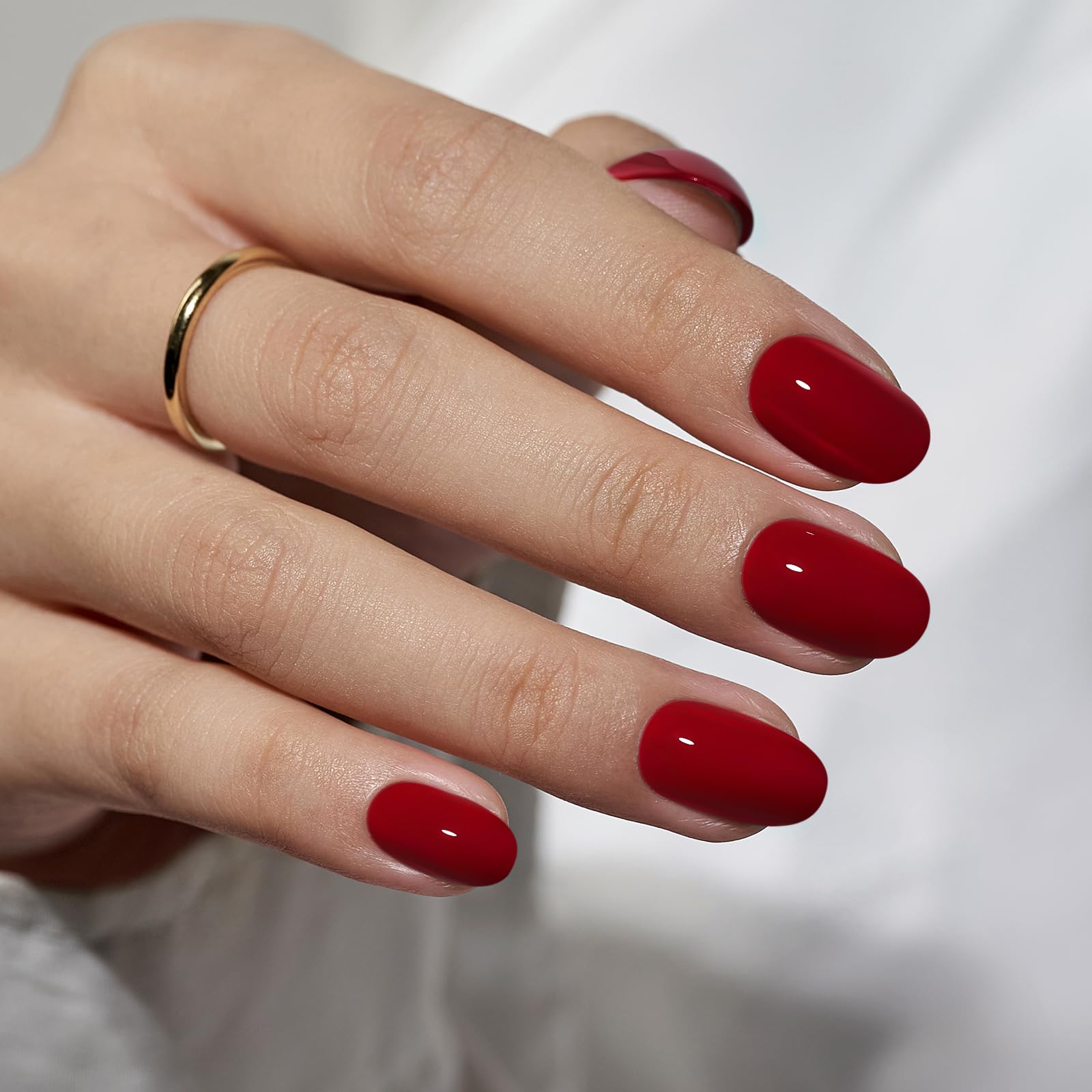 BTArtbox Cardinal red short nails closeup with glossy gel finish for everyday wear.