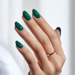 BTArtbox short dark green nails on fingers showing natural fit for busy days.